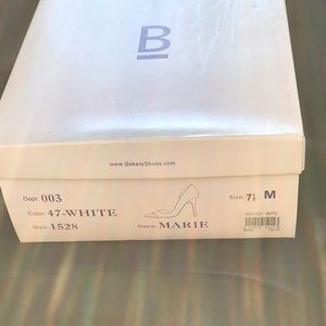 Woman’s size 7 1/2 white leather heels